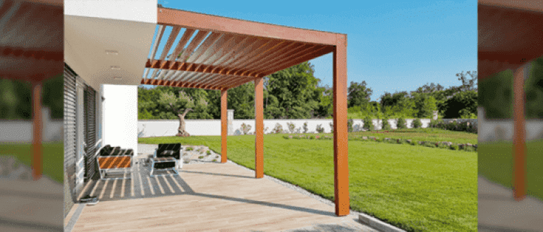 jardin avec une maison équipée d'une pergola