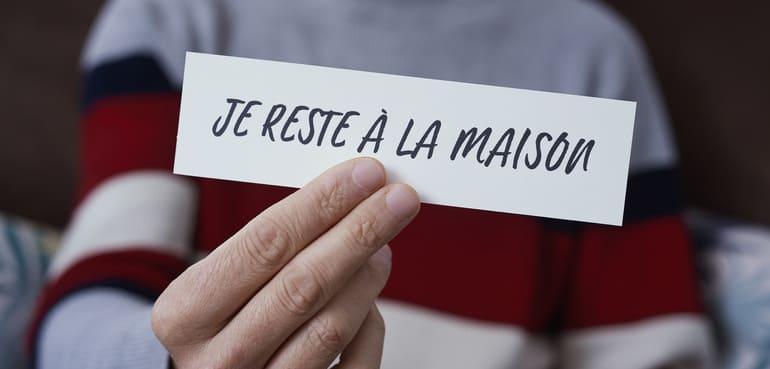 pancarte je reste a la maison